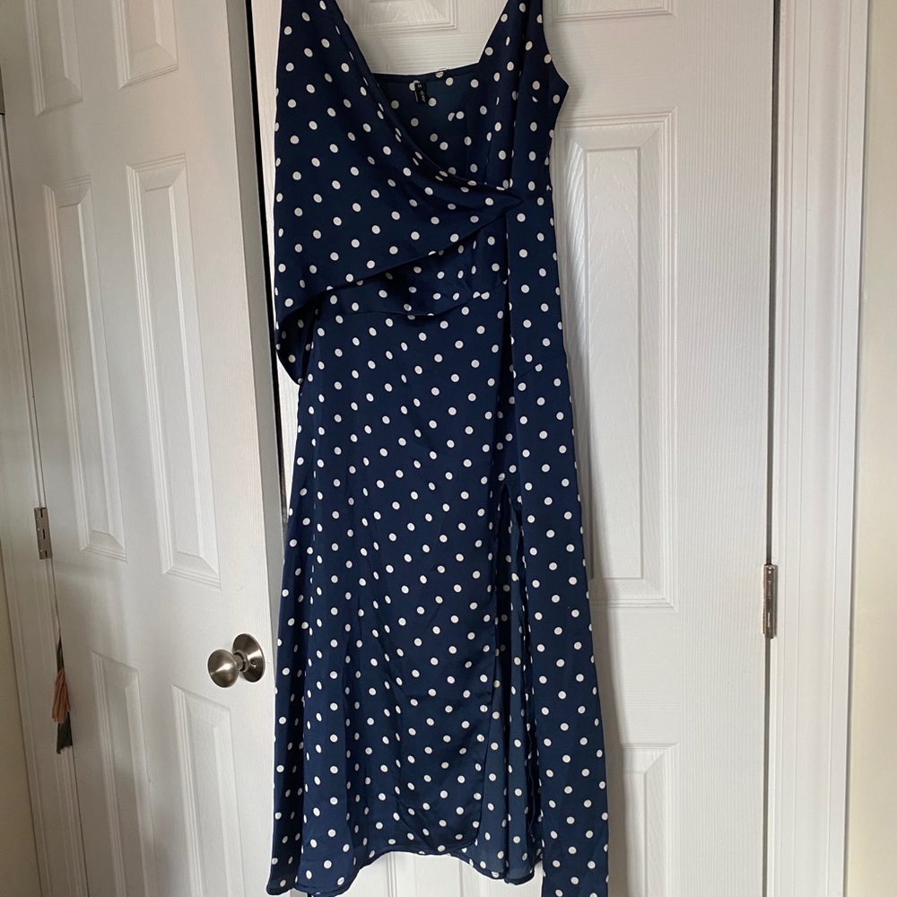 Navy polka dot asymmetrical dress